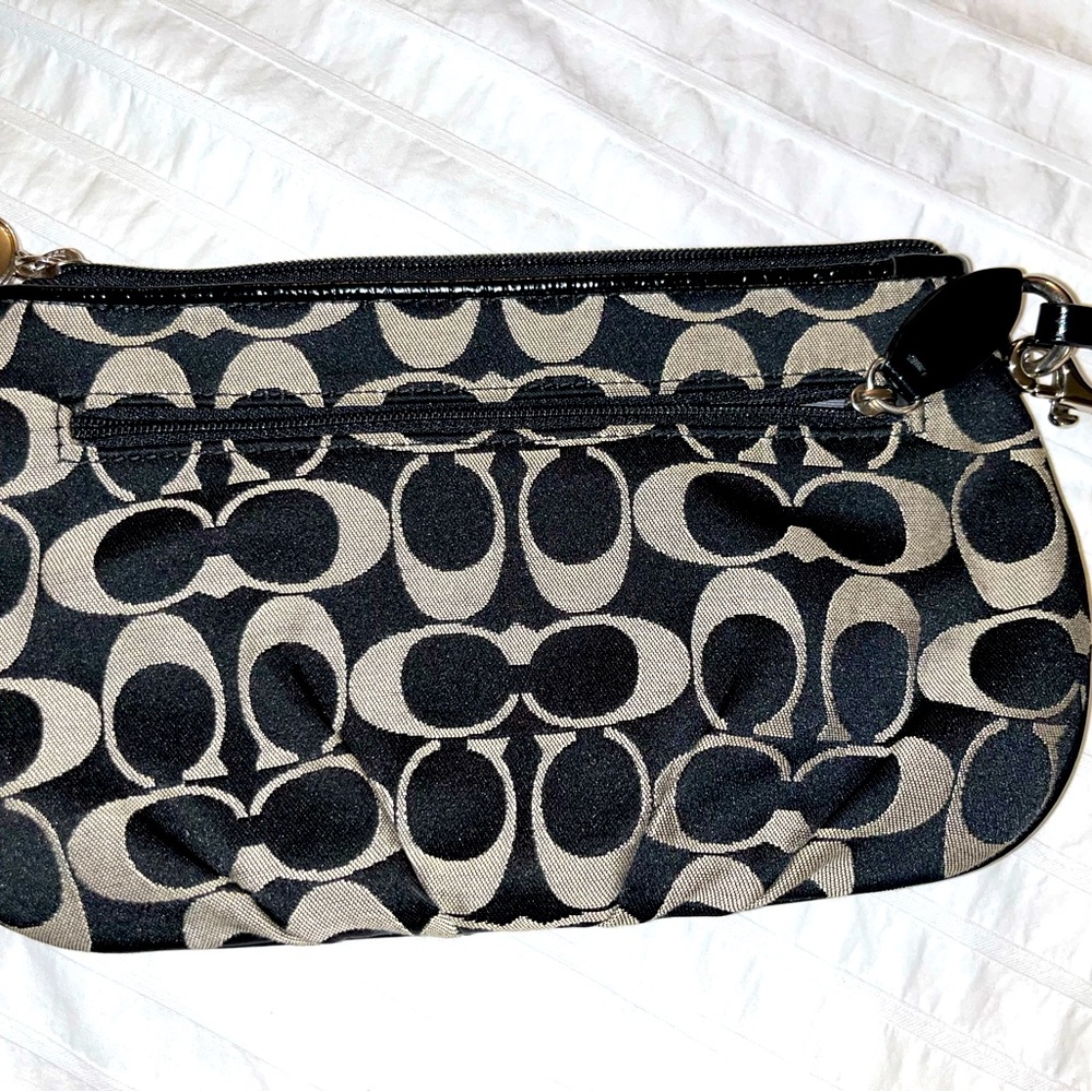 Selling my Large Coach Wristlet unused
